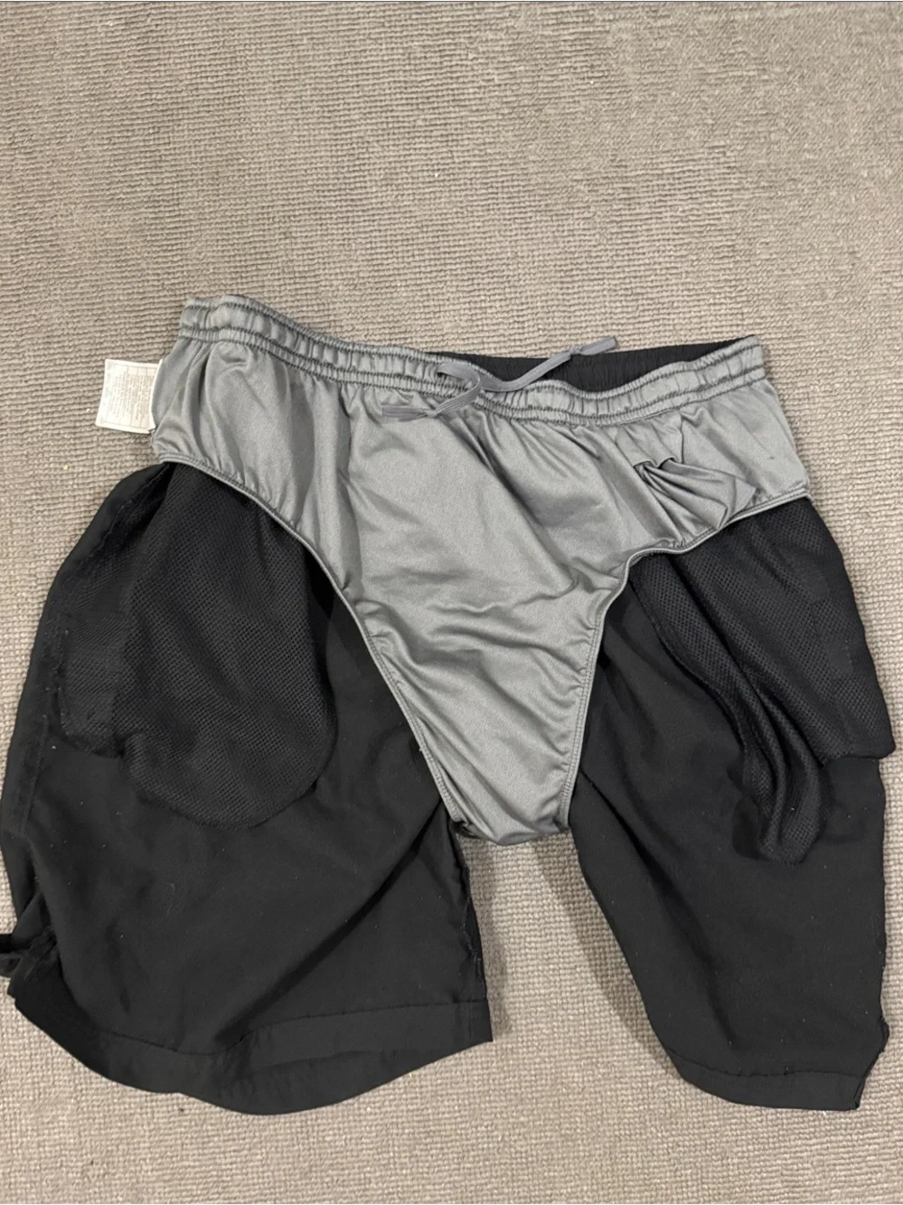 Nike Men’s Black Athletic Shorts with White Swoosh